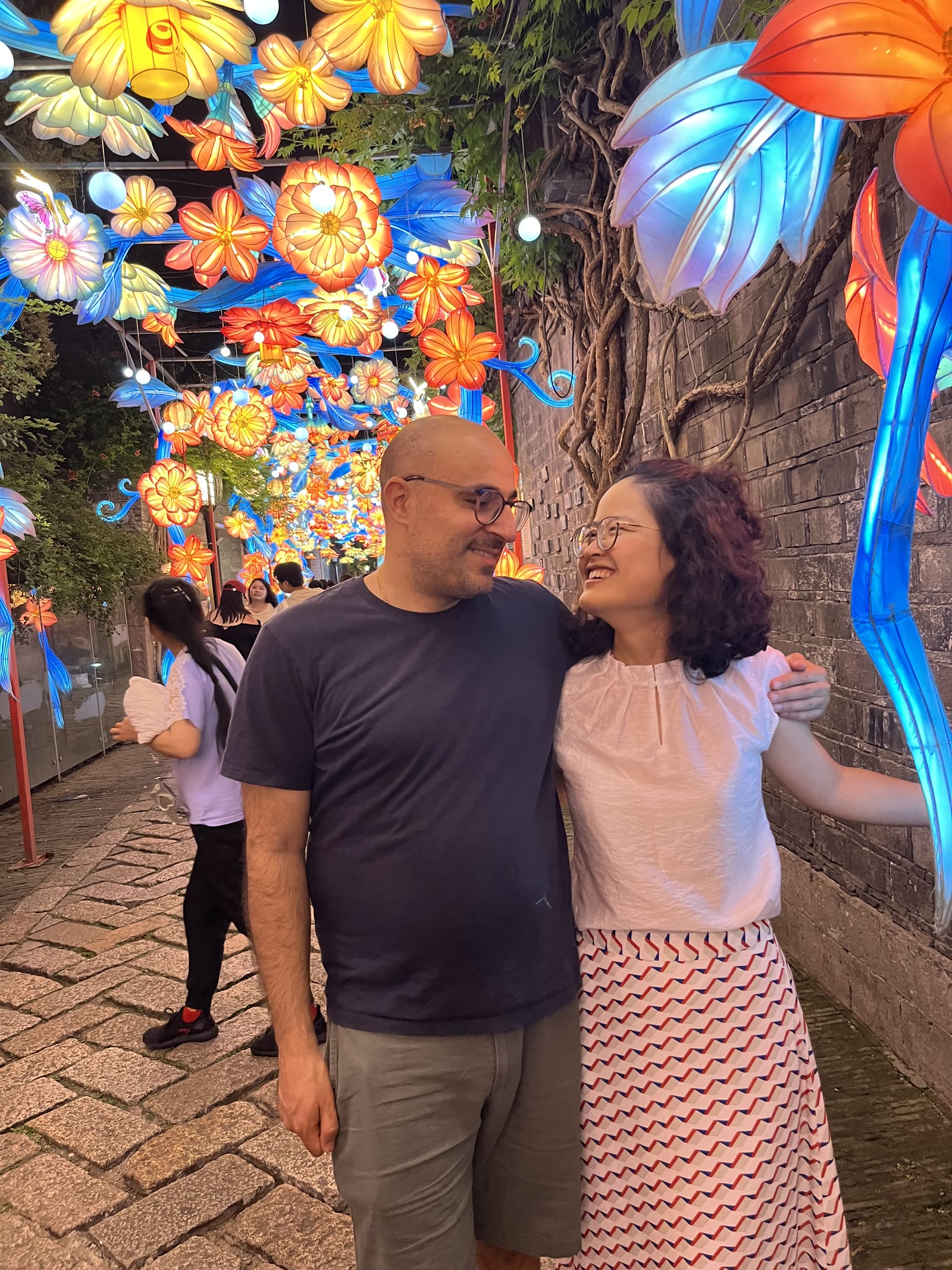 Haonan and Payam under festival lanterns